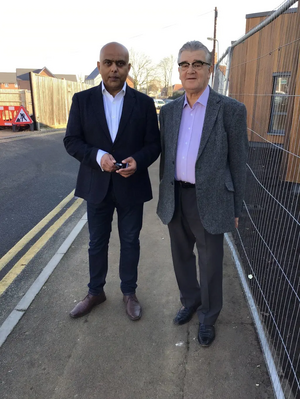 Ayub Khan and Melvin Caton outside new Stansted Community Hub building